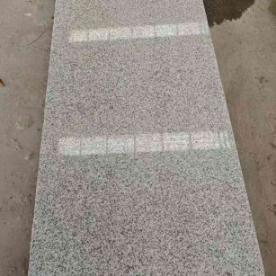 呼伦贝尔芝麻白光面毛板